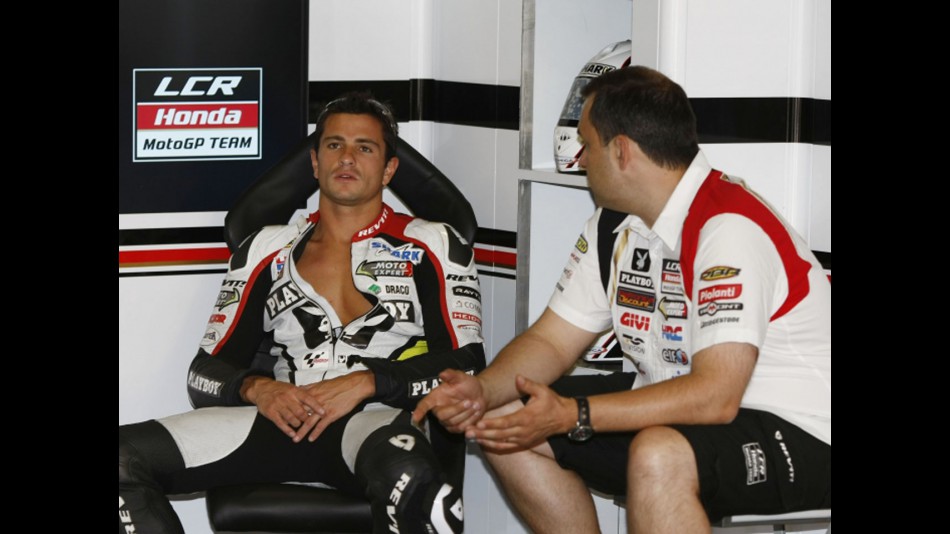 Randy de Puniet and his crew chief Christophe Bourguignon in the LCR Honda MotoGP garage