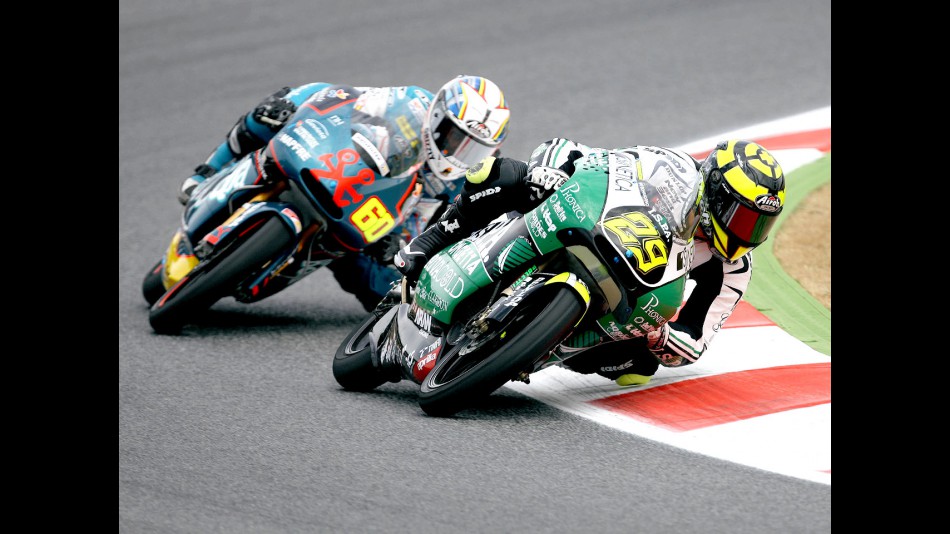 Andrea Iannone and Julian Simon on track