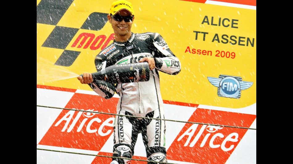 Hiroshi Aoyama on the podium at Assen