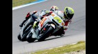 Toni Elias riding ahead of Marco Melandri in Assen
