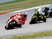 Nicky Hayden riding ahead of ames Toseland in Assen