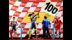 Valentino Rossi celebrates his 100th win on the podium in Assen