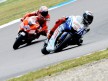 Jorge Lorenzo riding ahead of Casey Stoner in Assen