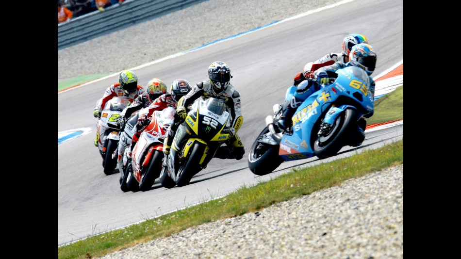 Loris Capirossi riding ahead of MotoGP group in Assen
