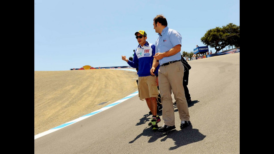 motogp.com commentator Gavin Emmett and Valentino Rossi at the Corkscrew in Laguna