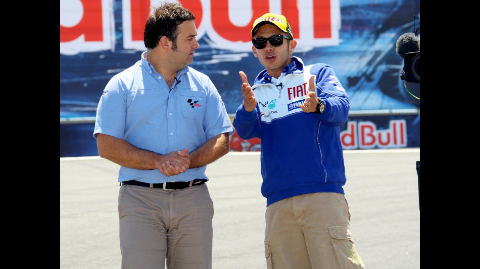motogp.com commentator Gavin Emmett and Valentino Rossi at the Corkscrew in Laguna
