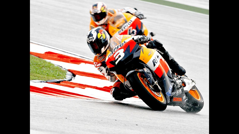 Pedrosa riding ahead of Dovizioso in Sepang