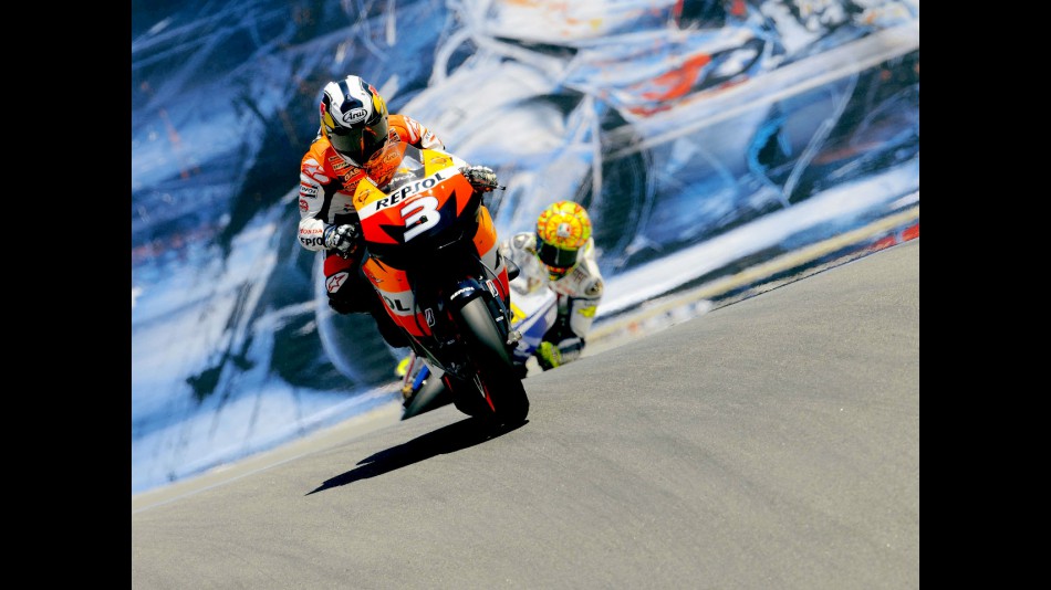 Pedrosa and Rossi at the Corkscrew in Laguna Seca