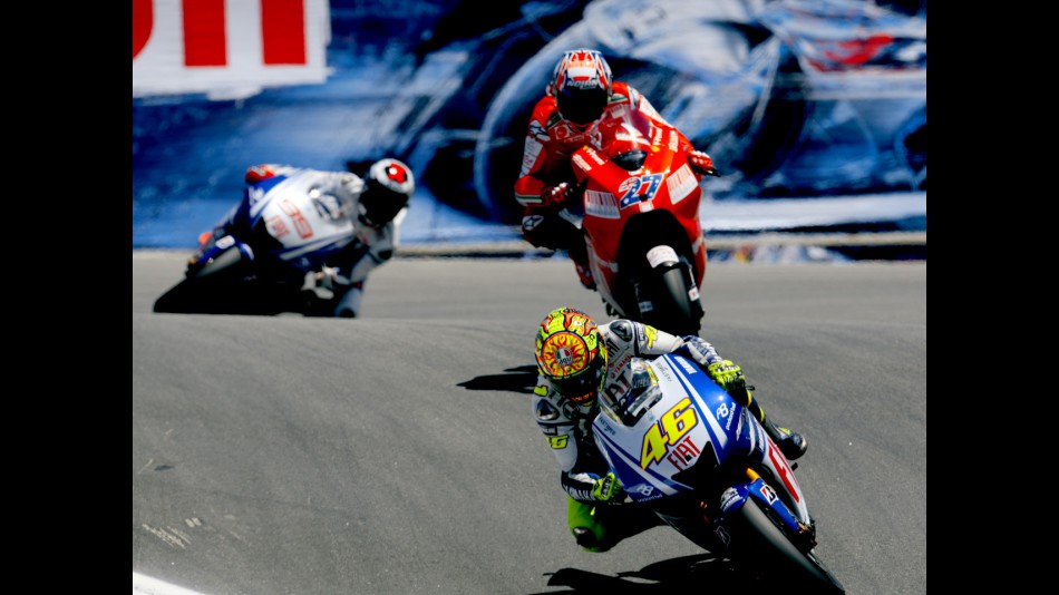 Rossi riding ahead of Stoner and Lorenzo at the Red Bull U.S. Grand Prix