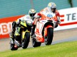 Niccolò Canepa riding ahead of Colin Edwards in Sachsenring