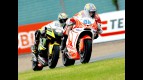 Niccolò Canepa riding ahead of Colin Edwards in Sachsenring