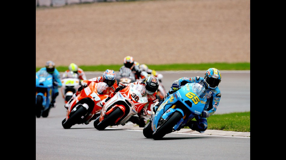 Loris Capirossi riding ahead of MotoGP group in Sachsenring