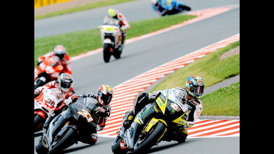 Colin Edwards riding ahead of MotoGP group in Sachsenring