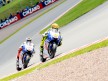 Yamaha riders Rossi and Lorenzo in action in Sachsenring