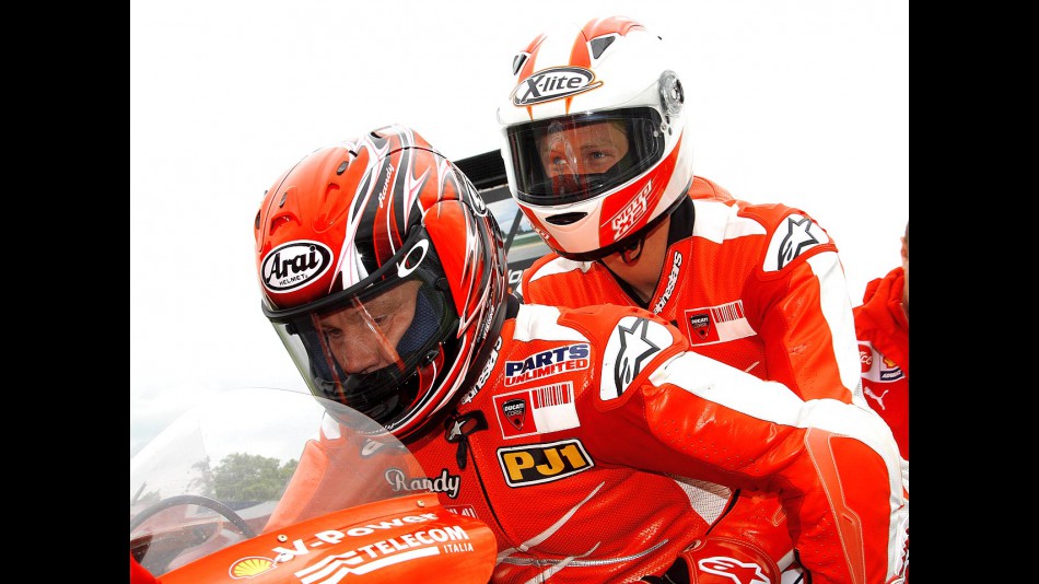 Prince Harry of Wales with Randy Mamola on the MotoX2 in Donington