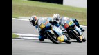 Bradley Smith riding ahead of Julián Simón in Donington