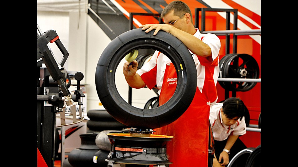 Bridgestone technicians preparing tyres in their workshop