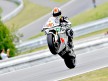 Gabor Talmacsi pulls of a wheelie in Brno