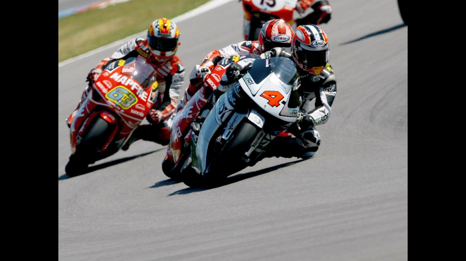 Hiroshi Aoyama riding ahead of 250cc group in Brno