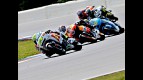 Toni Elias and Andrea Dovizioso riding ahead of MotoGP group in Brno