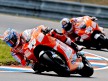 Nicky Hayden and Mika Kallio in action