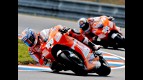 Nicky Hayden and Mika Kallio in action