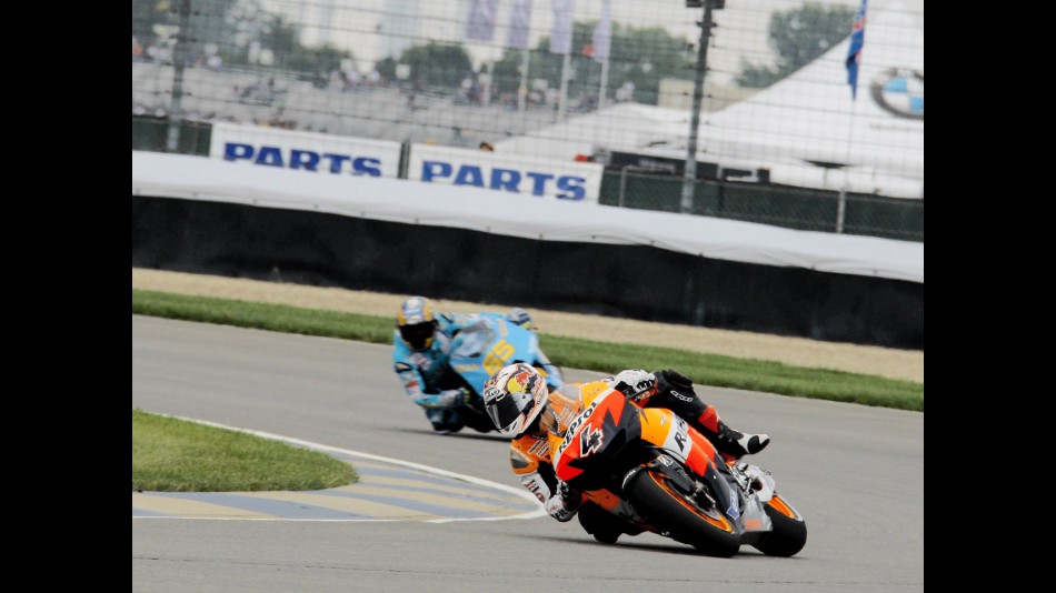 Andrea Dovizioso riding ahead of Loris Capirossi in Indianapolis