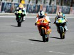 Pol Espargaró riding ahead of Smith and Corsi at Red Bull Indianapolis Grand Prix