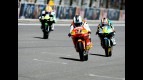 Pol Espargaró riding ahead of Smith and Corsi at Red Bull Indianapolis Grand Prix