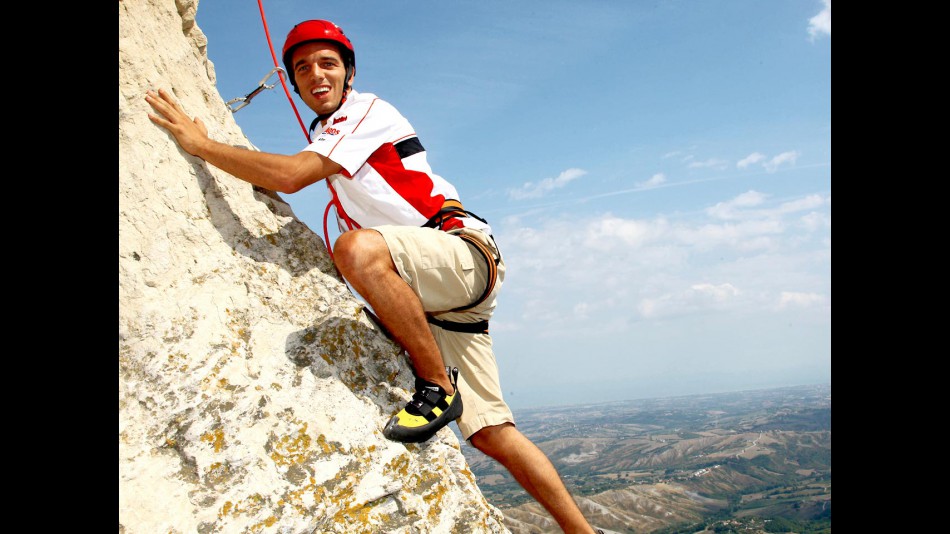 Alex de Angelis abseiling in San Marino