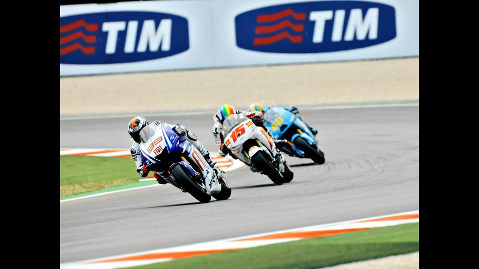 Lorenzo riding ahead of De Angelis and Capirossi in Misano