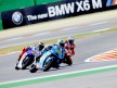 Capirossi, Hayden and Lorenzo in action in Misano