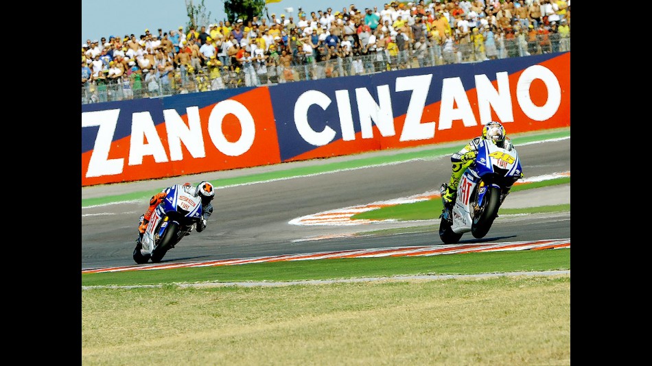 Rossi riding ahead of Lorenzo in Misano