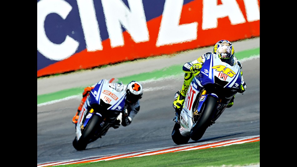 Rossi riding ahead of Lorenzo in Misano