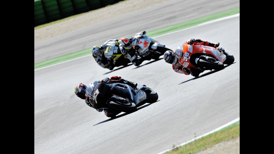 Melandri riding ahead of Kallio, Talmacsi and Toseland in Misano