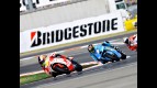Aleix Espargaró riding ahead of Chris Vermeulen in Misano