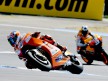 Casey Stoner riding ahead of Dani Pedrosa in Estoril