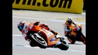 Casey Stoner riding ahead of Dani Pedrosa in Estoril
