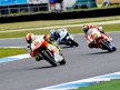Simoncelli riding ahead of Barberá and De Rosa in Phillip Island