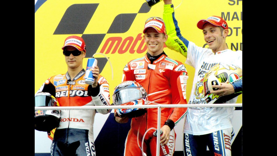 Pedrosa, Stoner and  Rossi on the podium at Sepang
