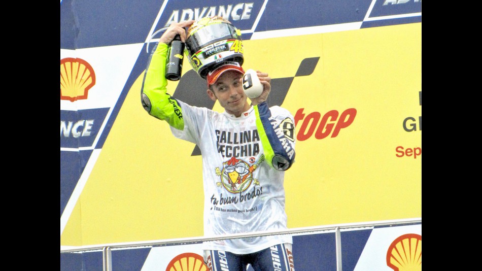 2009 MotoGP World Champion Valentino Rossi on the podium at Sepang