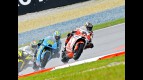 Kallio riding ahead of Capirossi and Edwards in Sepang
