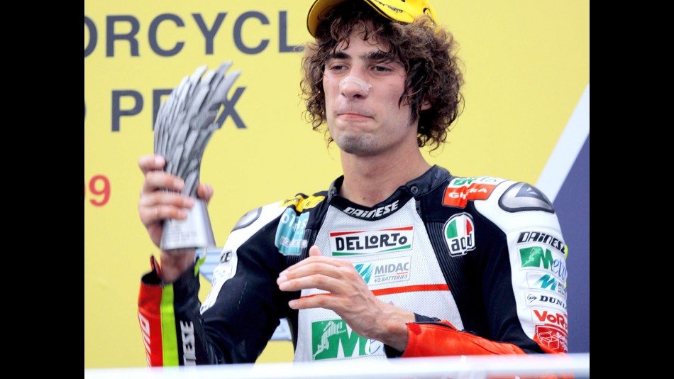 Marco Simoncelli on the podium at Sepang
