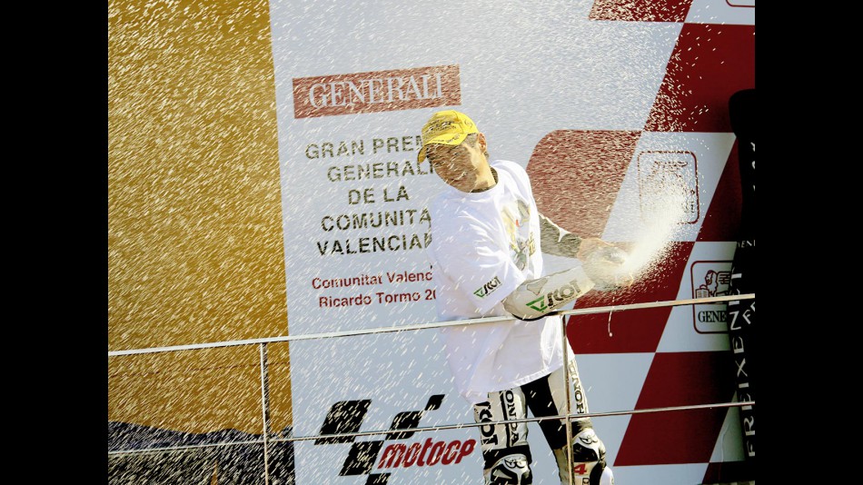 2009 250cc World Champion Hiroshi Aoyama on the podium in Valencia