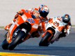 Casey Stoner and Mika Kallio in action at at the Valencia Post GP Test