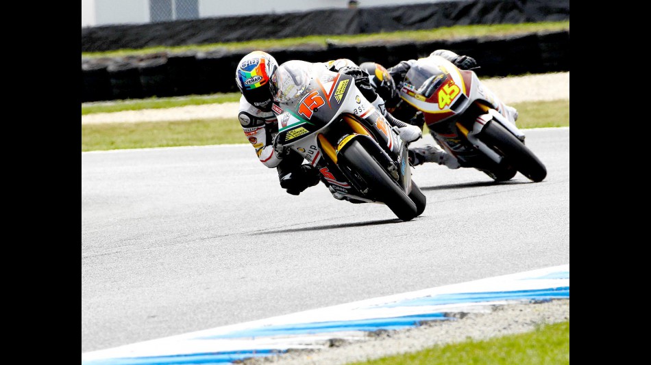 Alex de Angelis riding ahead of Redding at Phillip Island