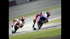 Lorenzo riding ahead of Simoncelli in Qatar