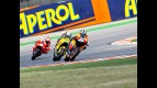 Pedrosa ridng ahead of Barberá and Hayden