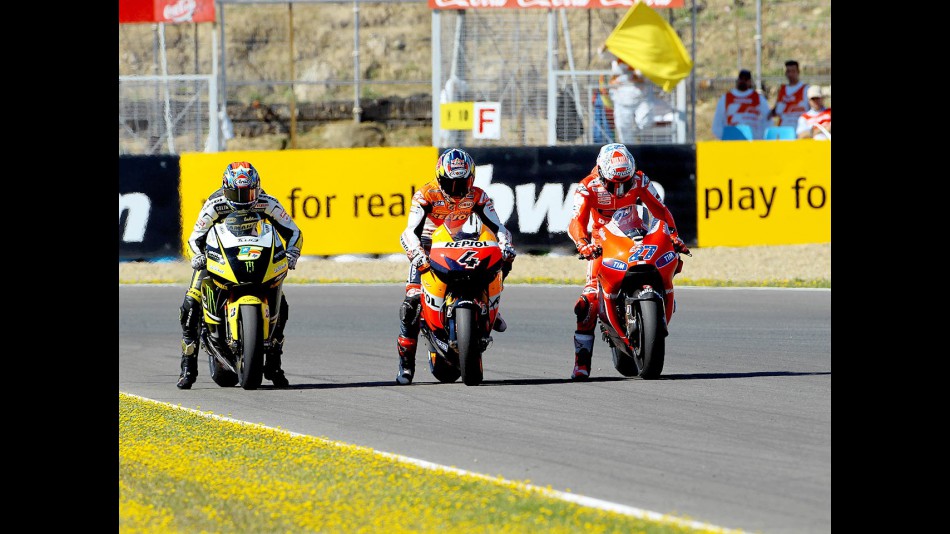 Edwards, Dovizioso and Stoner at the finish of the QP in Jerez