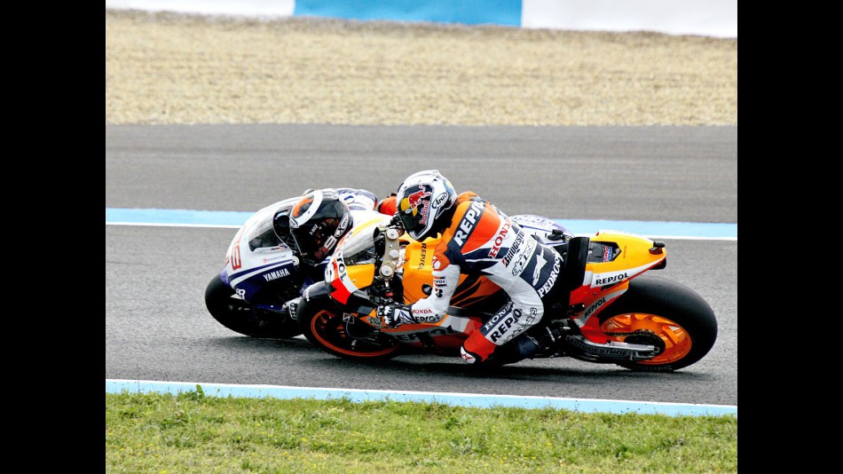 Lorenzo and Pedrosa riding head to head during the race in Jerez